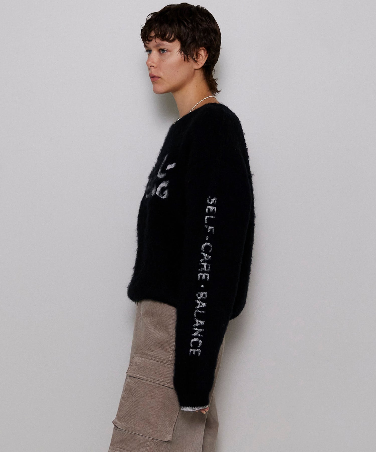 【PRE-ORDER】WELLBEING Logo Jacquard Knit Sweater